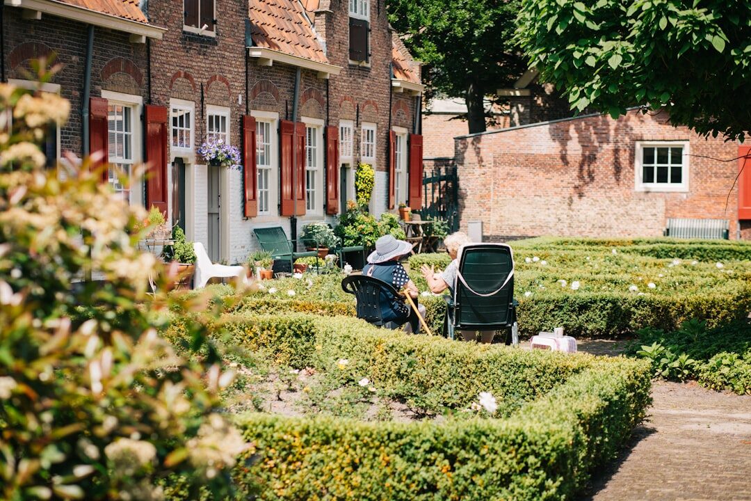 elderly people gardening together