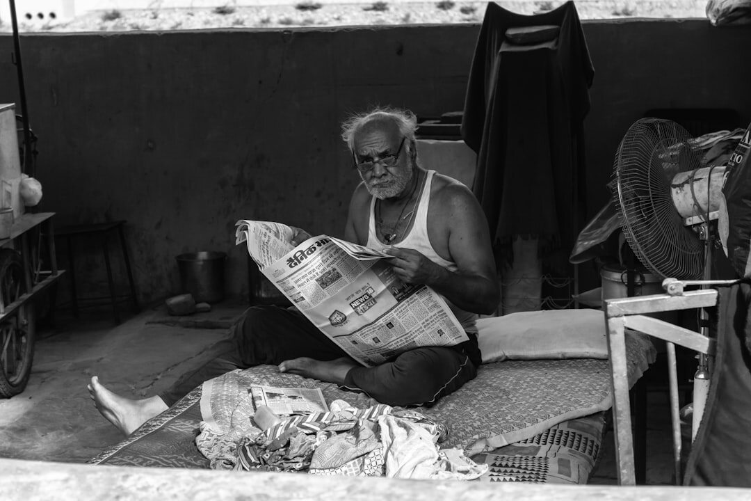 elderly woman reading map