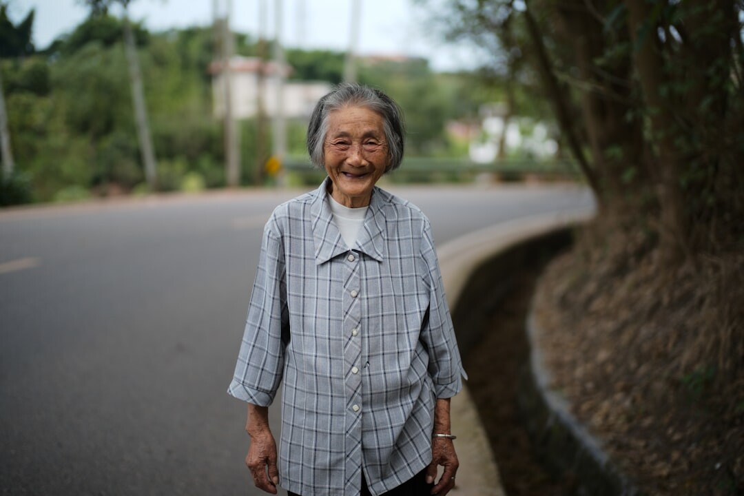 happy senior smiling outdoors